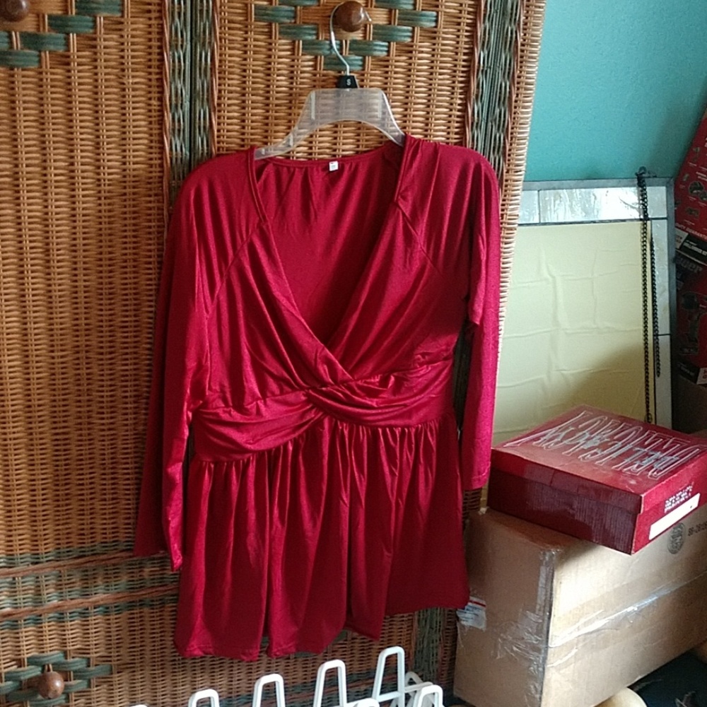 A long sleeve shirt and lots of cleavage.